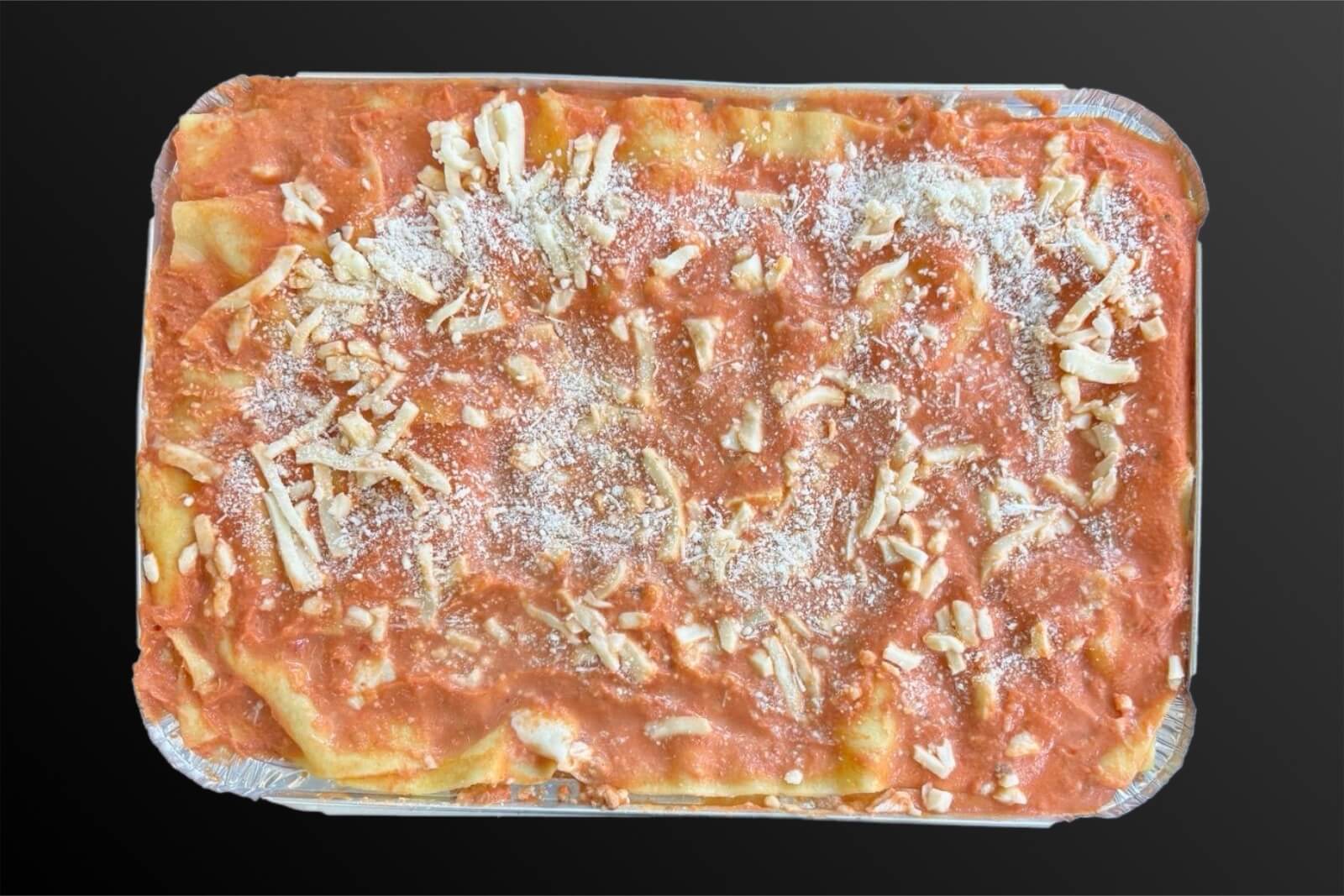 Lasagna fresca artigianale pronta da cuocere preparata da Sale & Pepe QB a San Benedetto del Tronto.